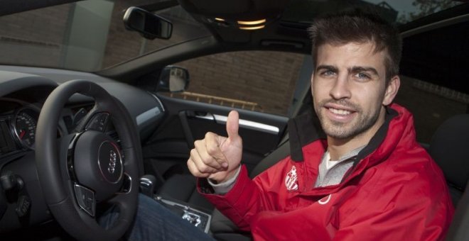 Gerard Piqué, al volante de un coche Audi en un acto publicitario con el Barcelona.