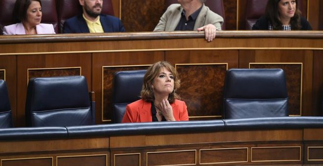 La ministra de Justicia, Dolores Delgado, en su escaño durante el pleno del Congreso de los Diputados. EFE/Fernando Villar