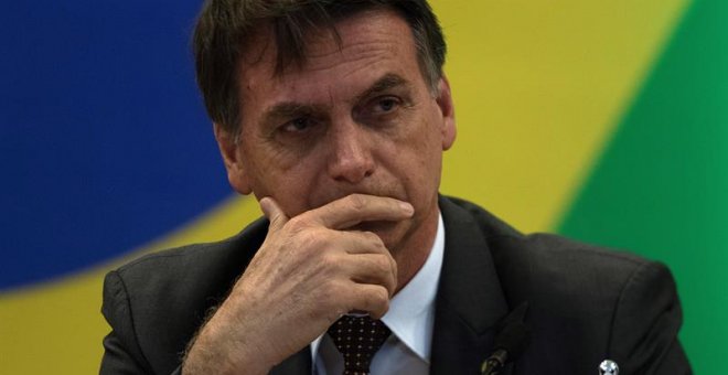 14/11/2018.- El presidente electo de Brasil, Jair Bolsonaro, asiste a una reunión con gobernadores de estados hoy, miércoles 14 de noviembre de 2018, en Brasilia (Brasil). Bolsonaro, quien asumirá la Presidencia el próximo 1 de enero, prepara su transició