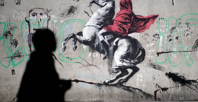 Una obra atribuida a Banksy en París. / REUTERS - BENOIT TESSIER