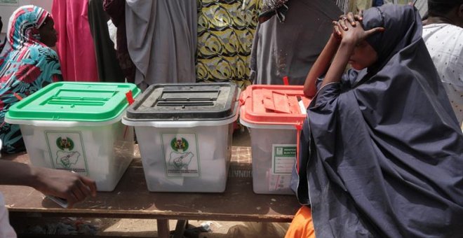 A Nigerian voter waits to cast her ballot in the presidential elections in Kano, Nigeria 23 February 2019. Nigerians head to the polls to vote in the presidential and parliamentary elections after being delayed by one week by the Independent National Ele