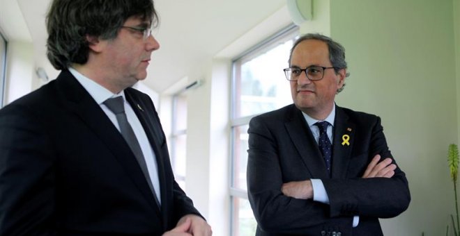 El presidente de la Generalitat, Quim Torra y el expresidente catalán Carles Puigdemont. EFE