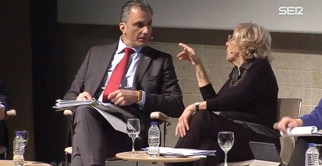 Javier Ortega Smith y Manuela Carmena, durante el debate.