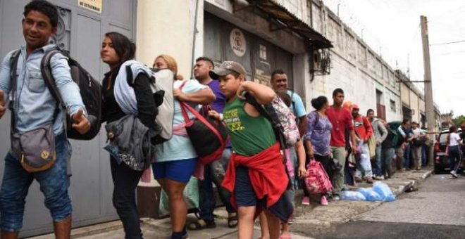 Migrantes hondureños en la frontera estadounidense./ AFP