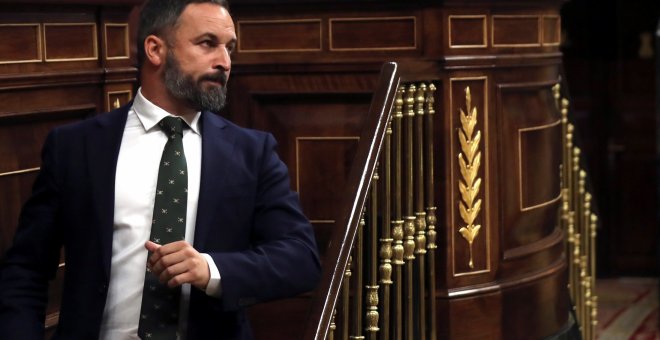 El presidente de Vox, Santiago Abascal, interviene  ante el Pleno del Congreso, donde la vicepresidenta en funciones, Carmen Calvo, ha comparecido para explicar la crisis del Open Arms. EFE/ Kiko Huesca