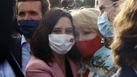 Casado (i), Ayuso (c) y Aguirre, en el mitin del cierre de campaña del PP en Madrid. EFE Casado, Ayuso y Aguirre, en el mitin del cierre de campaña del PP en Madrid. EFE