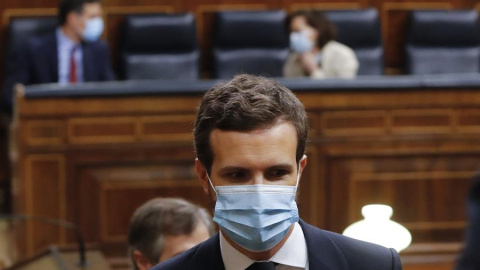 El líder del Partido Popular, Pablo Casado, en el pleno del Congreso que debate este miércoles la quinta prórroga del estado de alarma. EFE El líder del Partido Popular, Pablo Casado, en el pleno del Congreso que debate este miércoles la quinta prórroga del estado de alarma. EFE