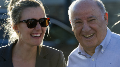 Amancio Ortega y su hija Marta Ortega riéndose (Foto de Archivo). -MIGUEL RIOPA / AFP Amancio Ortega y su hija Marta Ortega riéndose (Foto de Archivo). -MIGUEL RIOPA / AFP