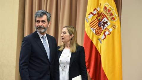 El presidente del Tribunal Supremo y del Consejo General del Poder Judicial, Carlos Lesmes, junto a la presidenta del Congreso, Ana Pastor , momentos antes de su comparecencia ante la Comisión de Justicia del Congreso de los Diputados para informar del e El presidente del Tribunal Supremo y del Consejo General del Poder Judicial, Carlos Lesmes, junto a la presidenta del Congreso, Ana Pastor , momentos antes de su comparecencia ante la Comisión de Justicia del Congreso de los Diputados para informar del e