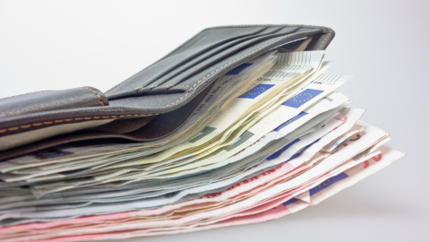 Una cartera con dinero. / Pixabay Una cartera con dinero. / Pixabay