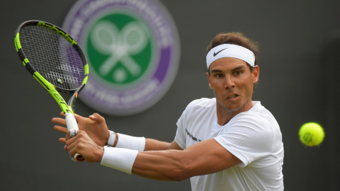 Rafa Nadal en su debut en Wimbledon ante John Millman./REUTERS Rafa Nadal en su debut en Wimbledon ante John Millman./REUTERS