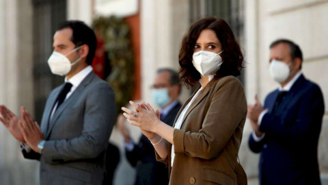 La presidenta de la Comunidad de Madrid, Isabel Díaz Ayuso, y el exvicepresidente Ignacio Aguado, en un acto en memoria de los fallecidos por la covid-19. La presidenta de la Comunidad de Madrid, Isabel Díaz Ayuso, y el exvicepresidente Ignacio Aguado, en un acto en memoria de los fallecidos por la covid-19.