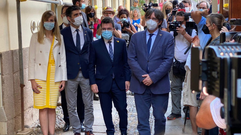 Pere Aragonés y Carles Puigdemont, en Alguer (Cerdeña). Pere Aragonés y Carles Puigdemont, en Alguer (Cerdeña).