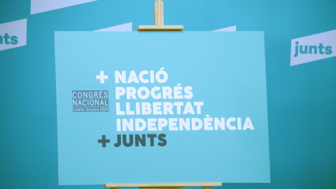 Cartell del congrés nacional de Junts, amb les paraules 'nació, progrés, llibertat i independència' destacades. Cartell del congrés nacional de Junts, amb les paraules 'nació, progrés, llibertat i independència' destacades.