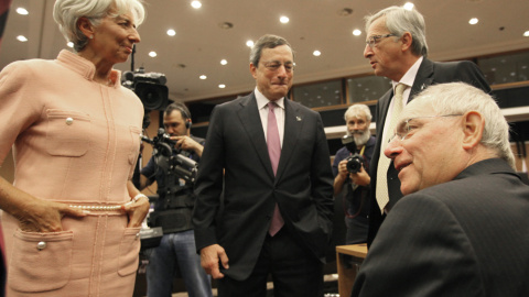 Christine Lagarde, Mario Draghi y Jean-Claude Juncker en una reunión informal del Eurogrupo en Nicosia (Chipre). AFP/ Yiannis Kourtoglou Christine Lagarde, Mario Draghi y Jean-Claude Juncker en una reunión informal del Eurogrupo en Nicosia (Chipre). AFP/ Yiannis Kourtoglou