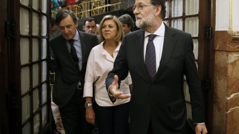 El presidente del Gobierno, Mariano Rajoy, abandona el hemiciclo del Congreso tras comparecer hoy en un pleno extraordinario para dar explicaciones de su declaración ante el tribunal del juicio del caso Gürtel y sobre la supuesta financiación ilegal de El presidente del Gobierno, Mariano Rajoy, abandona el hemiciclo del Congreso tras comparecer hoy en un pleno extraordinario para dar explicaciones de su declaración ante el tribunal del juicio del caso Gürtel y sobre la supuesta financiación ilegal de