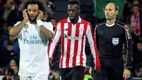 El defensa brasileño del Real Madrid Marcelo Vieira (i) y el centrocampista del Athletic Iñaki Williams durante el partido. | MIGUEL TOÑA (EFE) El defensa brasileño del Real Madrid Marcelo Vieira (i) y el centrocampista del Athletic Iñaki Williams durante el partido. | MIGUEL TOÑA (EFE)