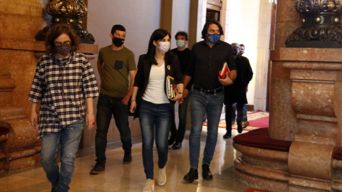 Els negociadors d'ERC, JxCat i la CUP sortint de la reunió celebrada al Parlament aquest dimecres. Els negociadors d'ERC, JxCat i la CUP sortint de la reunió celebrada al Parlament aquest dimecres.