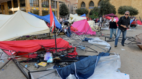 Partidarios de Hezbolá y sus aliados de Amal han atacado y desmantelado la acampada antigubernamental en el centro de Beirut. - EFE Partidarios de Hezbolá y sus aliados de Amal han atacado y desmantelado la acampada antigubernamental en el centro de Beirut. - EFE