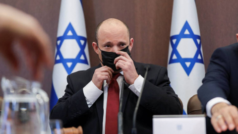 El primer ministro israelí, Naftali Bennett, con mascarilla durante la reunión del Gobierno este 19 de diciembre de 2021. El primer ministro israelí, Naftali Bennett, con mascarilla durante la reunión del Gobierno este 19 de diciembre de 2021.