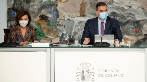 24/06/2021.- El presidente del Gobierno, Pedro Sánchez, y la vicepresidenta primera, Carmen Calvo, durante el Consejo de Ministros extraordinario del pasado jueves. EFE/Borja Puig de la Bellacasa 24/06/2021.- El presidente del Gobierno, Pedro Sánchez, y la vicepresidenta primera, Carmen Calvo, durante el Consejo de Ministros extraordinario del pasado jueves. EFE/Borja Puig de la Bellacasa