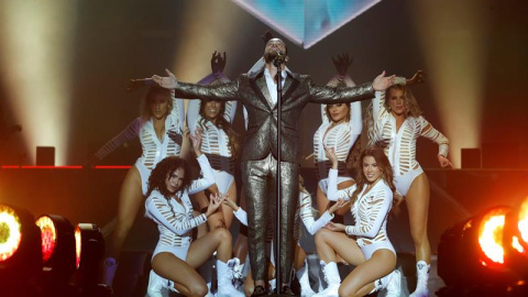 El cantante colombiano Maluma, durante el concierto en el Palacio de los Deportes de Madrid. /EFE El cantante colombiano Maluma, durante el concierto en el Palacio de los Deportes de Madrid. /EFE