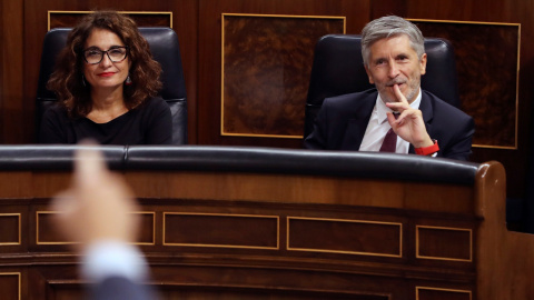 La ministra de Hacienda, Maria Jesús Montero, y el de Interior, Fernando Grande-Marlaska, durante la sesión de control al Gobierno. EFE/Ballesteros La ministra de Hacienda, Maria Jesús Montero, y el de Interior, Fernando Grande-Marlaska, durante la sesión de control al Gobierno. EFE/Ballesteros