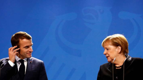 El presidente Macron y la canciller Merkel en Berlín. (FABRIZIO BENSCH) El presidente Macron y la canciller Merkel en Berlín. (FABRIZIO BENSCH)