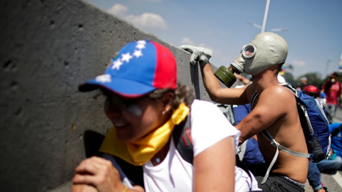 30/04/2019 - Enfrentamientos en los alrededores de la base militar 'La Carlota' en Caracas. / REUTERS 30/04/2019 - Enfrentamientos en los alrededores de la base militar 'La Carlota' en Caracas. / REUTERS