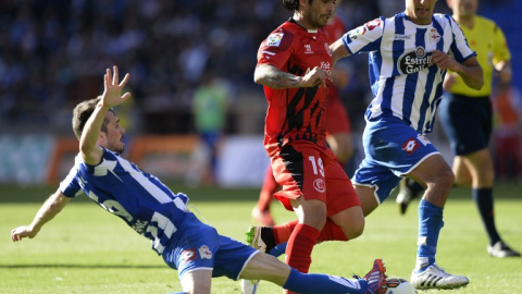 Celso Borges corre junto a Ever Banega en un reciente partido de Liga. /AFP Celso Borges corre junto a Ever Banega en un reciente partido de Liga. /AFP