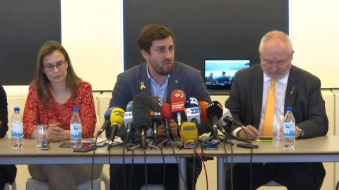 Meritxell Serret, Toni Comín i Lluís Puig en roda de premsa des de Brussel·les / Televisió de Catalunya Meritxell Serret, Toni Comín i Lluís Puig en roda de premsa des de Brussel·les / Televisió de Catalunya