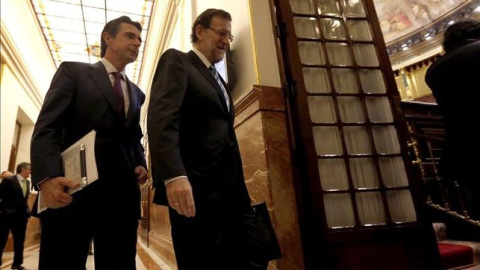 El presidente del Gobierno en funciones, Mariano Rajoy, junto al ya exministro de Industria, José Manuel Soria. EFE El presidente del Gobierno en funciones, Mariano Rajoy, junto al ya exministro de Industria, José Manuel Soria. EFE