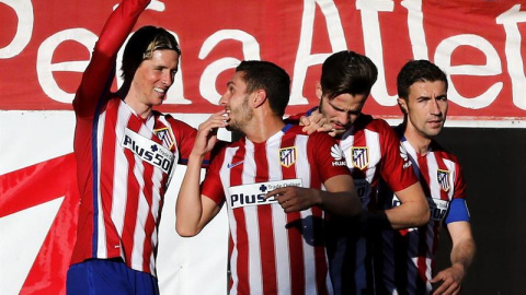 Los jugadores del Atlético celebran uno de los goles contra el Granada. /EFE Los jugadores del Atlético celebran uno de los goles contra el Granada. /EFE