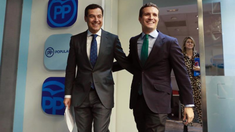 El presidente del PP, Pablo Casado (d), junto al candidato del PP a la Junta, Juanma Moreno (i), se dirigen a la rueda de prensa tras la reunión hoy del Comité Ejecutivo Nacional de su partido para analizar el resultado de las elecciones an El presidente del PP, Pablo Casado (d), junto al candidato del PP a la Junta, Juanma Moreno (i), se dirigen a la rueda de prensa tras la reunión hoy del Comité Ejecutivo Nacional de su partido para analizar el resultado de las elecciones an