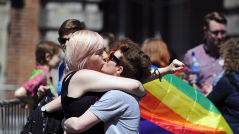 A couple kiss after early results suggest an overwhelming majority in favour of the referendum on same-sex marriage, in Dublin, Ireland, 23 May 2015. With counting still taking place in the historic referendum, early results are suggesting A couple kiss after early results suggest an overwhelming majority in favour of the referendum on same-sex marriage, in Dublin, Ireland, 23 May 2015. With counting still taking place in the historic referendum, early results are suggesting