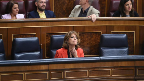 La ministra de Justicia, Dolores Delgado, en su escaño durante el pleno del Congreso de los Diputados. EFE/Fernando Villar La ministra de Justicia, Dolores Delgado, en su escaño durante el pleno del Congreso de los Diputados. EFE/Fernando Villar