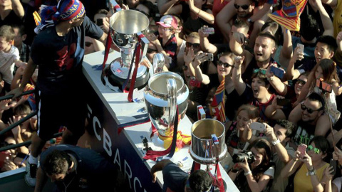 Un triplete al alcance de muy pocos y una ciudad volcada con el Barça.- EFE