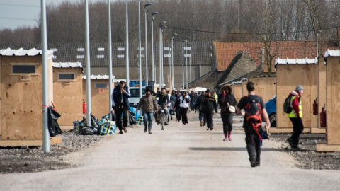 Imagen del campamento de refugiados de Grande-Synthe, en Dunkerque, junto a la frontera belga. AFP / DENIS CHARLET Imagen del campamento de refugiados de Grande-Synthe, en Dunkerque, junto a la frontera belga. AFP / DENIS CHARLET