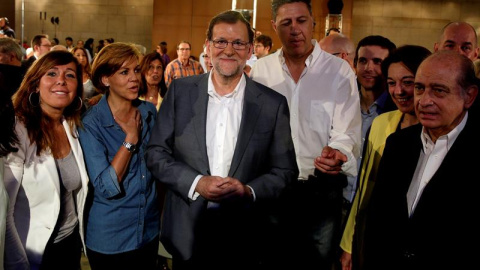 Mariano Rajoy, presidente del Gobierno en funciones, acompañado por varios dirigentes del PP en la presentación de las medidas del programa electoral. EFE/Alberto Estévez Mariano Rajoy, presidente del Gobierno en funciones, acompañado por varios dirigentes del PP en la presentación de las medidas del programa electoral. EFE/Alberto Estévez