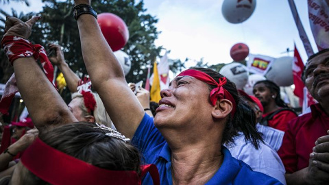Seguidores de Lula reaccionan tras conocer la condena al expresidente brasileño. - EFE