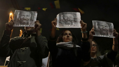 Manifestantes con una fotografía impresa de Temistocles Machado, uno de los líderes sociales asesinados. / Reuters Manifestantes con una fotografía impresa de Temistocles Machado, uno de los líderes sociales asesinados. / Reuters
