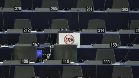 A poster which reads "no TTIP" is seen on the desk of a member of the European Parliament during a debate in Strasbourg, France, July 7, 2015. The European parliament will vote on Wednesday on the E.U.-U.S. Transatlantic Trade and Investmen A poster which reads "no TTIP" is seen on the desk of a member of the European Parliament during a debate in Strasbourg, France, July 7, 2015. The European parliament will vote on Wednesday on the E.U.-U.S. Transatlantic Trade and Investmen