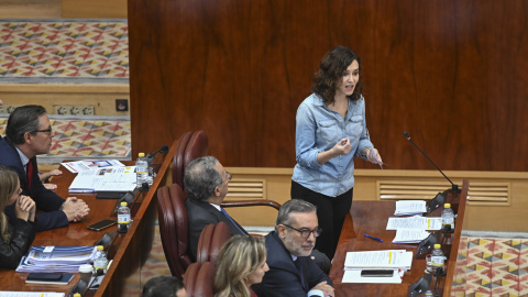 La presidenta de la comunidad de Madrid, Isabel Díaz Ayuso, este jueves en la Asamblea de Madrid. La presidenta de la comunidad de Madrid, Isabel Díaz Ayuso, este jueves en la Asamblea de Madrid.