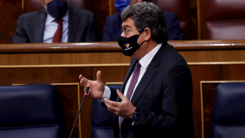 El ministro de Inclusión, Seguridad Social y Migraciones, José Luis Escrivá, durante su intervención en la sesión de control al Ejecutivo del 12 de mayo de 2021. El ministro de Inclusión, Seguridad Social y Migraciones, José Luis Escrivá, durante su intervención en la sesión de control al Ejecutivo del 12 de mayo de 2021.