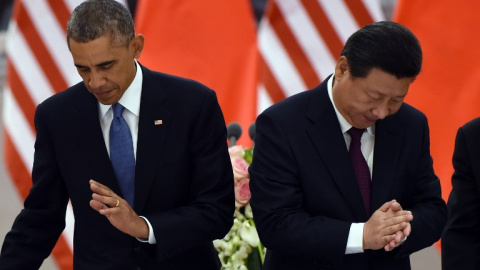 El presidente de China, Xi Jinping, junto a si homólogo estadounidense, Barack Obama, en noviembre de 2014. - AFP
