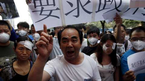 Los manifestantes pedían al Gobierno chino mayores ayudas y compensaciones económicas. REUTERS