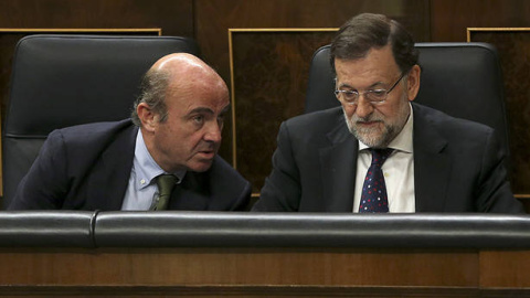 Luis De Guindos y Mariano Rajoy, en una imagen de archivo. EFE Luis De Guindos y Mariano Rajoy, en una imagen de archivo. EFE