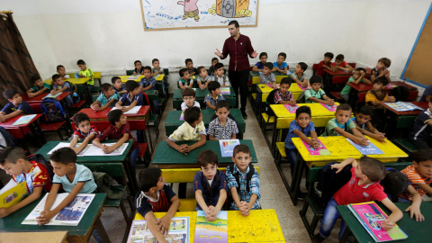 Una escuela en Jodania para los refugiados/REUTERS