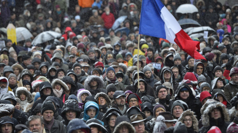 People attend a demonstration for peace and respect in Stockholm January 11, 2015. The rally is organised by Reporters without Borders and Swedish cartoonists in tribute to the 17 victims of the three-day Islamist killings in Paris, which s