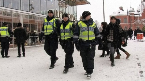 Agentes suecos de policía. F. BARBER